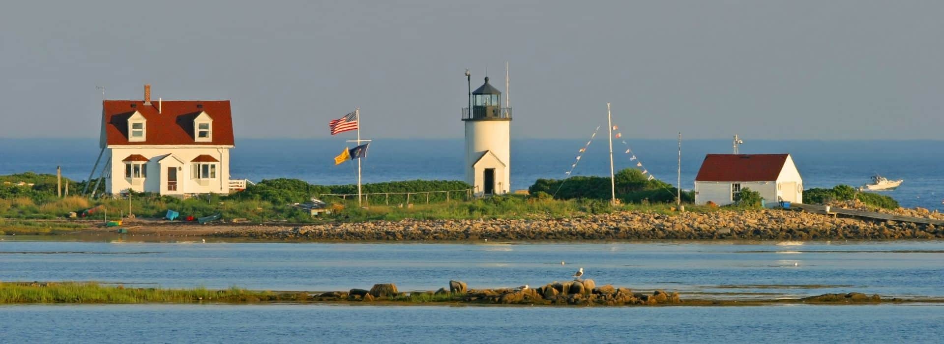 view of goat island lighthouse from across the water