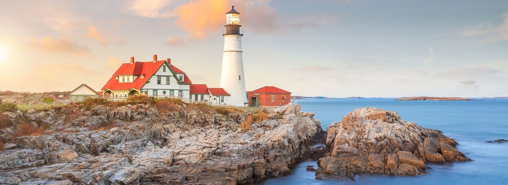 view of the portland head light at sunrise